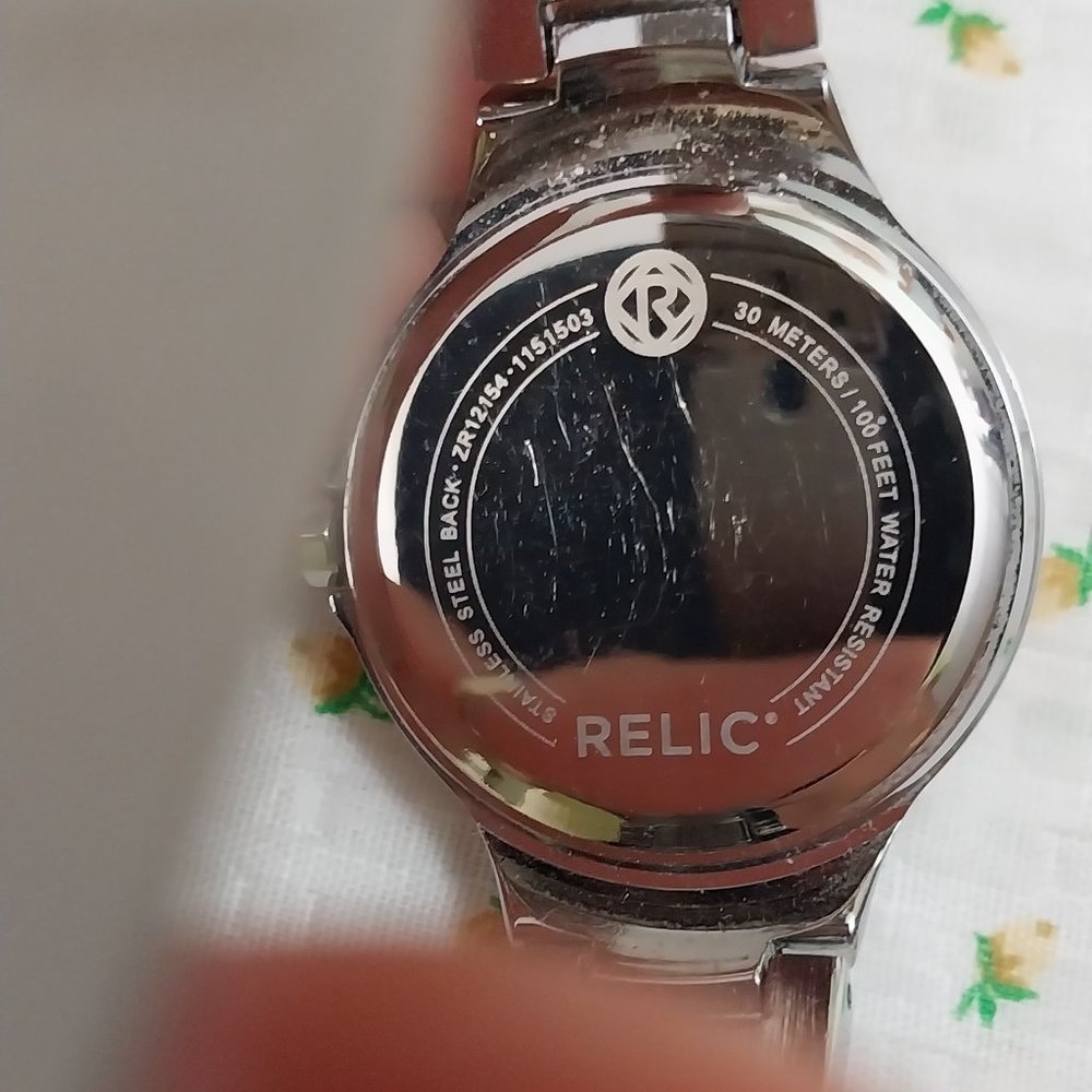 2949 Ladies Relic brand Watch, Rhinestones and Pick Pearl Face. Comes with case. - Picture 6 of 6